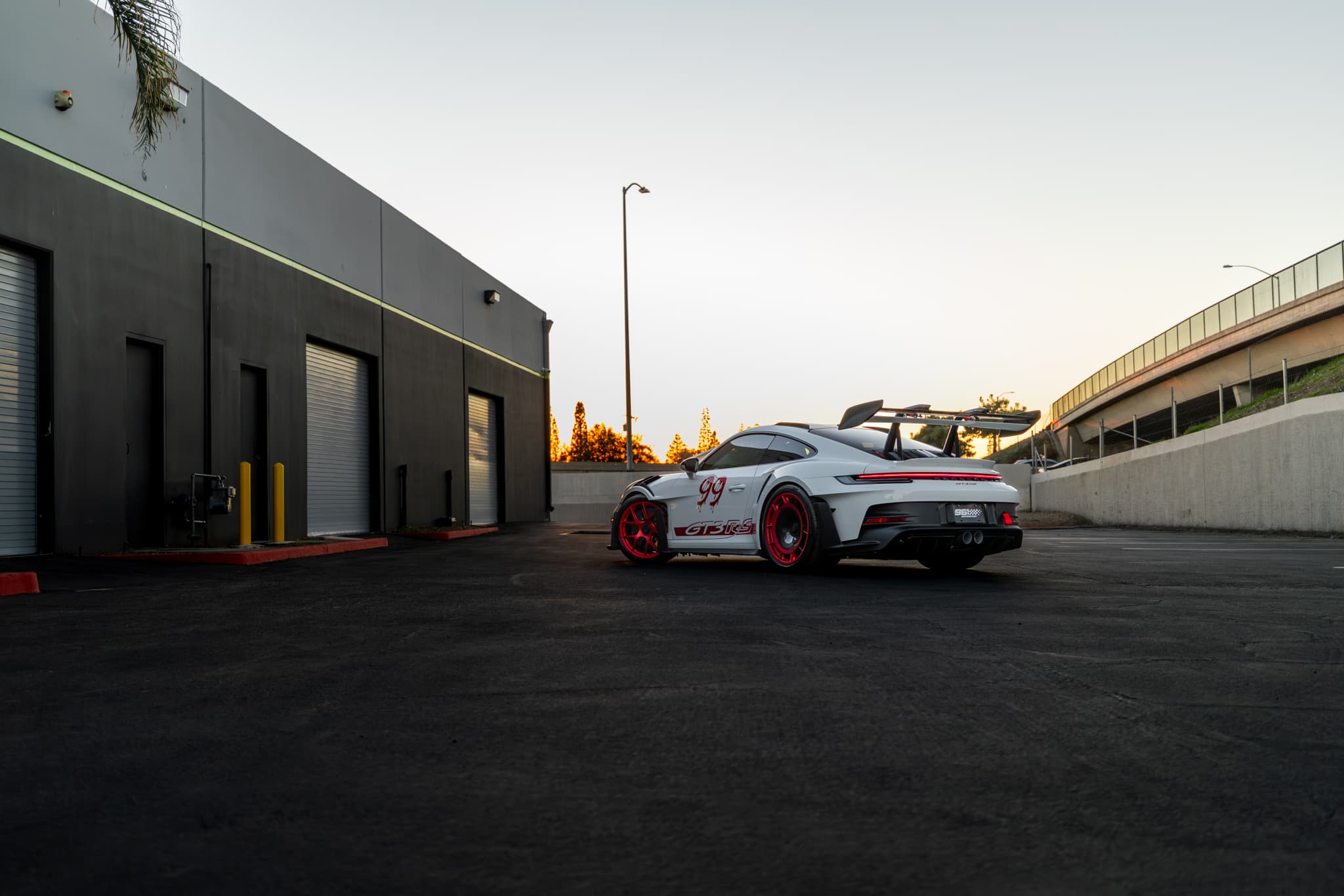 Porsche GT3 RS rear-quarter view at sunset
