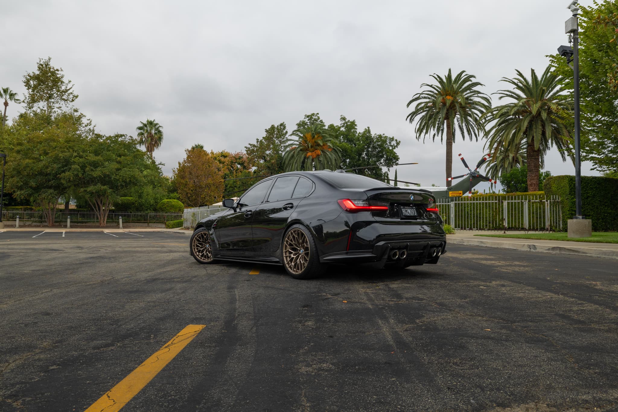 Black BMW performance sedan parked outside 961 Motorsport